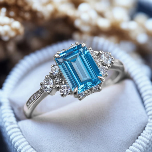 The Bethany 2CT Emerald Cut Blue Gemstone Halo Ring