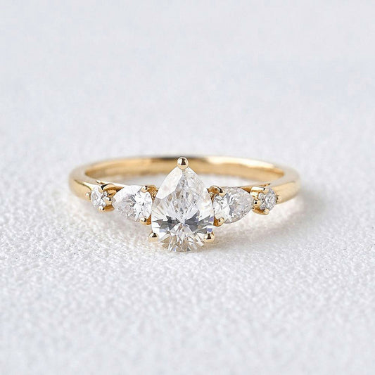 Stylist Pear Shaped Moissanite Rose Gold Ring
