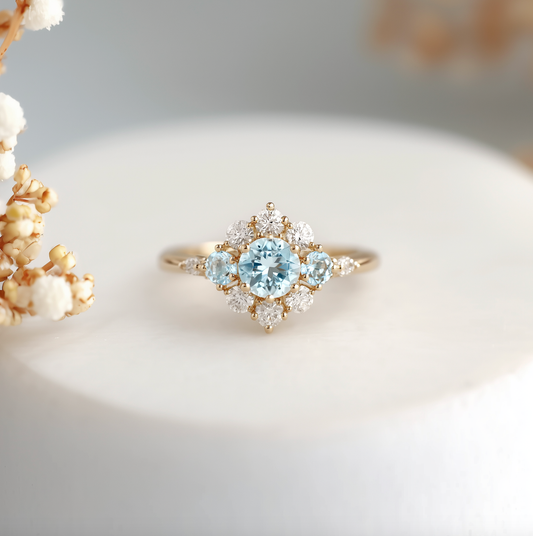 Elsa’s Flurry – Round Cut Snow Flakes Aquamarine Engagement Ring