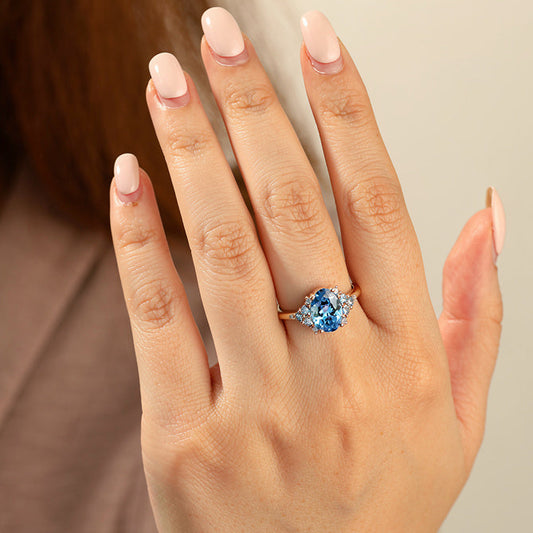 Celeste‘s Whisper | 2CT Oval Cut Blue Gemstone Ring