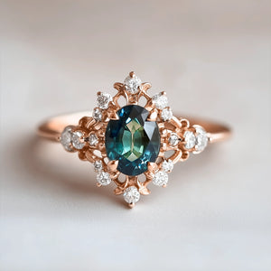 Isis' Crown Ring – Teal Sapphire & Diamond Halo Engagement Ring