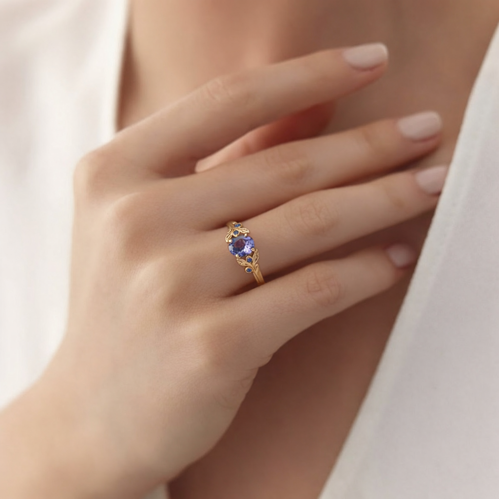 Aria‘s Glade | Oval Cut Tanzanite & Blue Diamond Leaf Engagement Ring