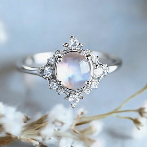 The Eternal Stars Engagement Ring – Cabochon Moonstone & Graduated Diamond Halo