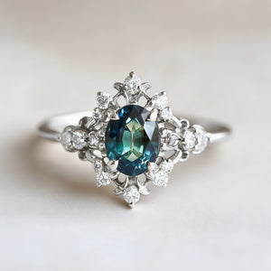 Isis' Crown Ring – Teal Sapphire & Diamond Halo Engagement Ring