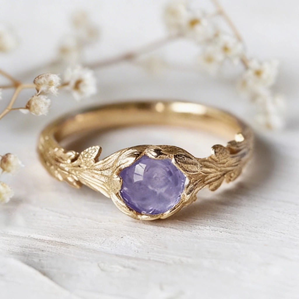 Daphne’s Branch | Round Tanzanite Engagement Ring with Sculptural Vine Band