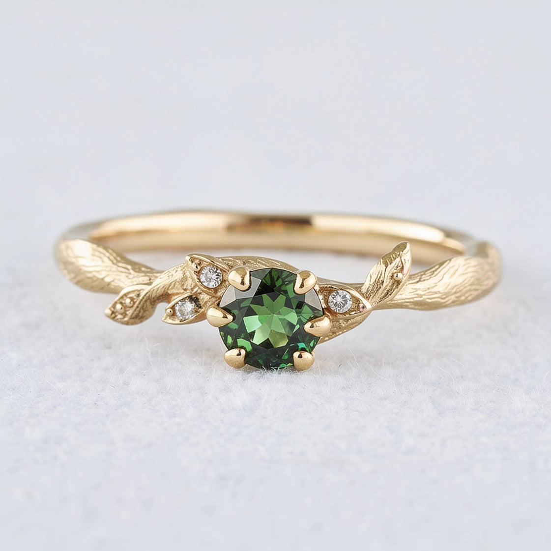 Rare Teal Sapphire Engagement Ring with a Delicate Fairy Leaf Band