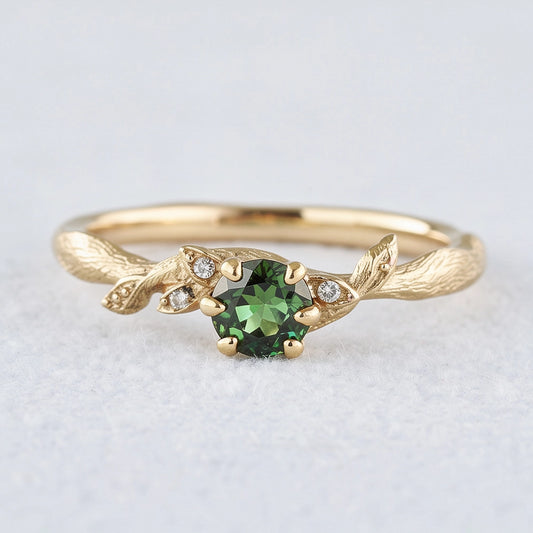 Rare Teal Sapphire Engagement Ring with a Delicate Fairy Leaf Band