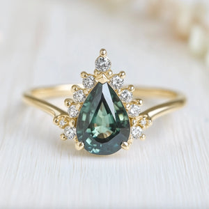 Mermaid’s Crown | Pear Teal Sapphire Halo Engagement Ring