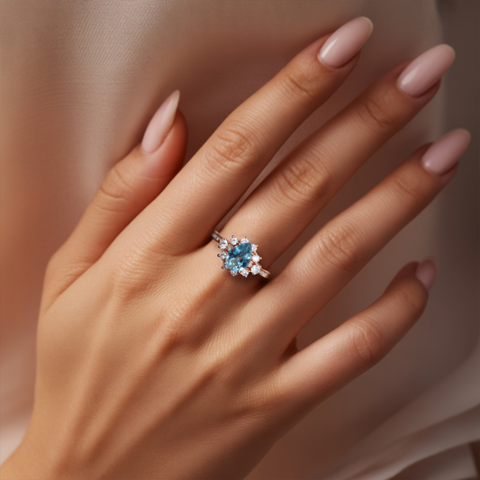The Bethany 2CT Pear Cut Blue Moissanite Halo Ring