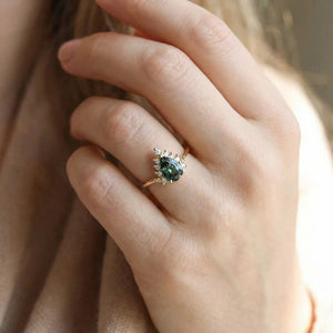 Mermaid’s Crown | Pear Teal Sapphire Halo Engagement Ring