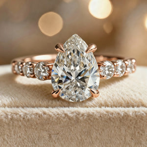 Aurora‘s Whisper | 2CT Pear Cut Moissanite Eternity Ring