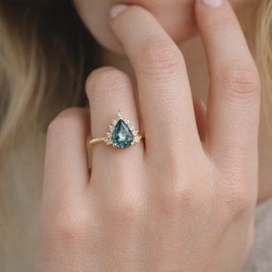 Mermaid’s Crown | Pear Teal Sapphire Halo Engagement Ring