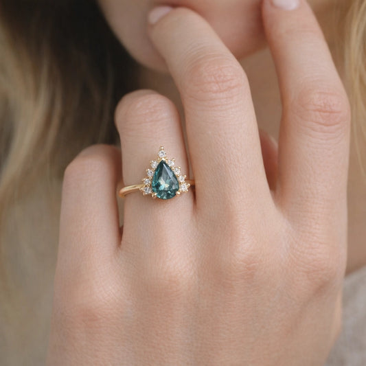 Mermaid’s Crown | Pear Teal Sapphire Halo Engagement Ring