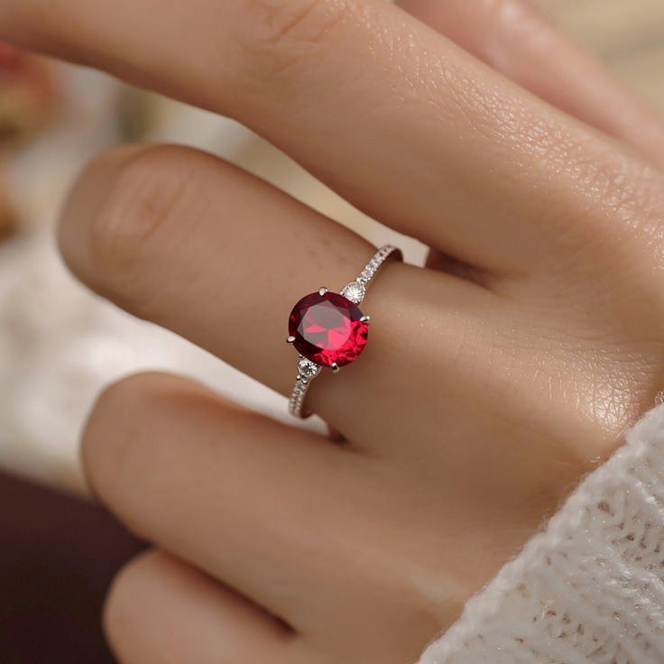 Iris’s Blaze | 2CT Oval-Cut Red Gemstone Ring