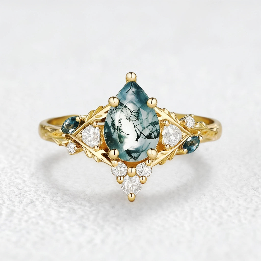 Katriel Pear Cut Lab Moss Agate Oak Leaf Engagement Ring