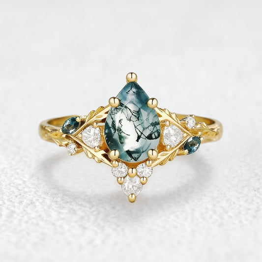 Katriel Pear Cut Lab Moss Agate Oak Leaf Engagement Ring