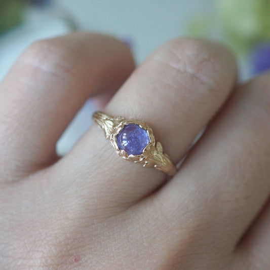 Daphne’s Branch | Round Tanzanite Engagement Ring with Sculptural Vine Band