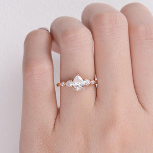Stylist Pear Shaped Moissanite Rose Gold Ring