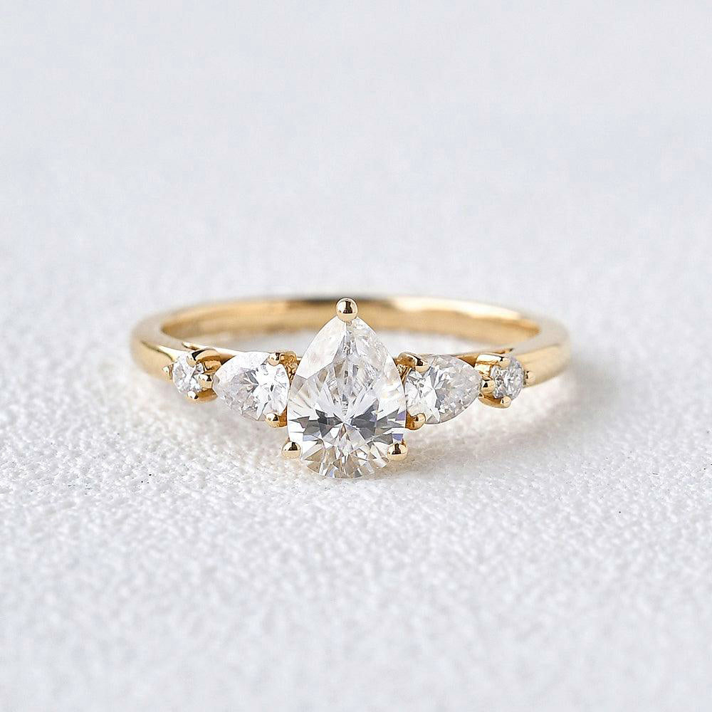 Stylist Pear Shaped Moissanite Rose Gold Ring