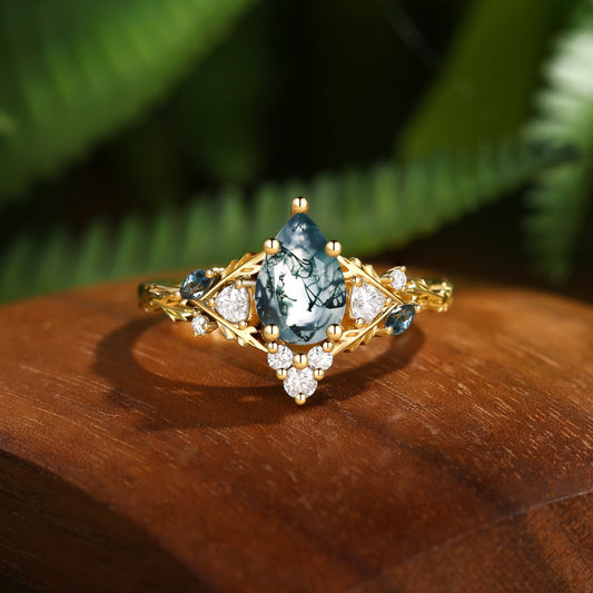 Katriel Pear Cut Lab Moss Agate Oak Leaf Engagement Ring