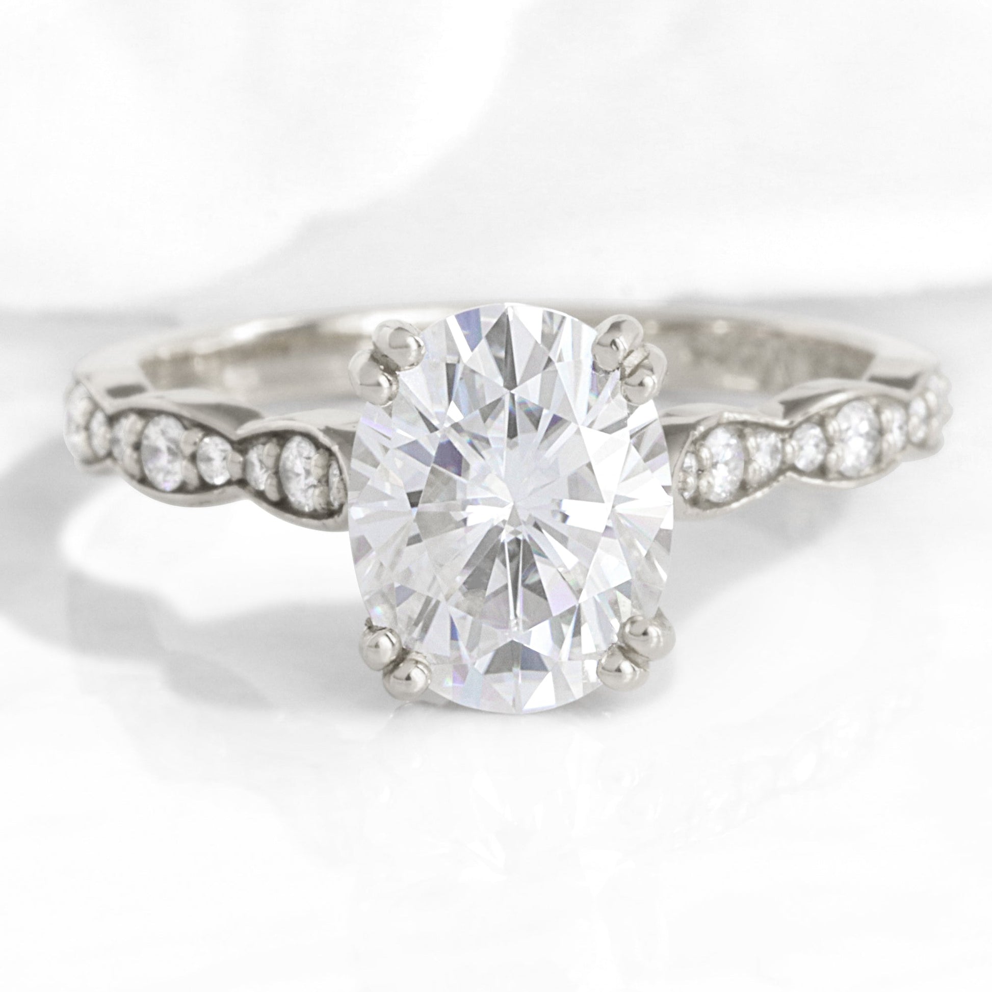 Oval Moissanite Engagement Ring in Grace Solitaire Diamond Band