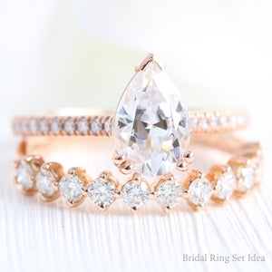 Pear Moissanite Engagement Ring in Grace Solitaire Pave Diamond Band