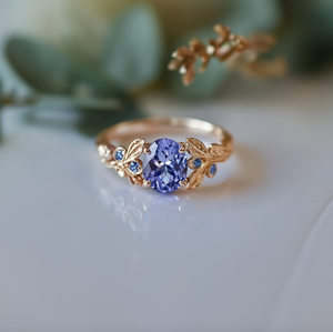 Aria‘s Glade | Oval Cut Tanzanite & Blue Diamond Leaf Engagement Ring