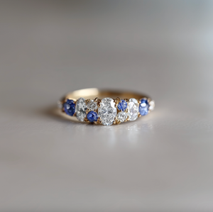 Cordelia’s Keepsake | Thistle Blue Sapphire & Moissanite Half‑Eternity Ring