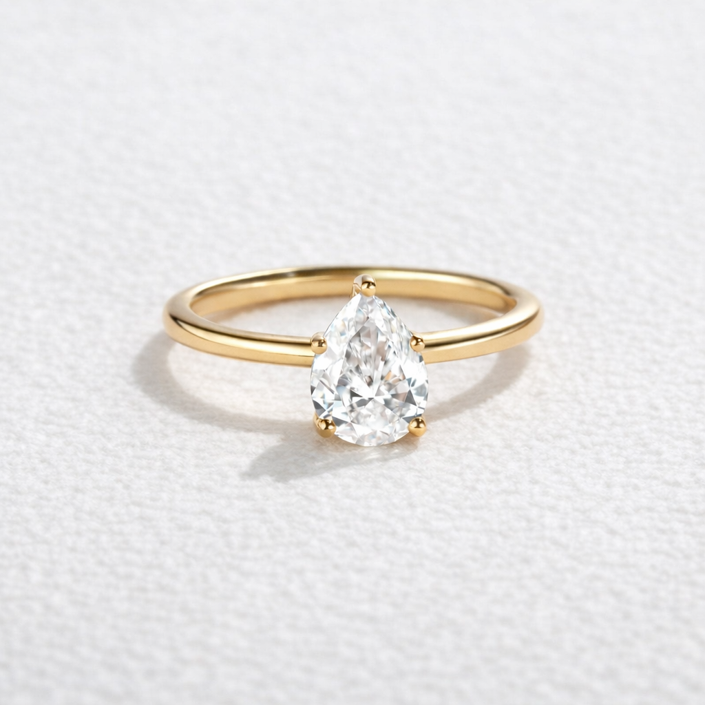 1.0ct Pear Shaped Moissanite Classic Solitaire Ring