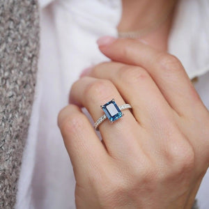 The Blue Camellia | 3CT Emerald-Cut Solitaire Ring