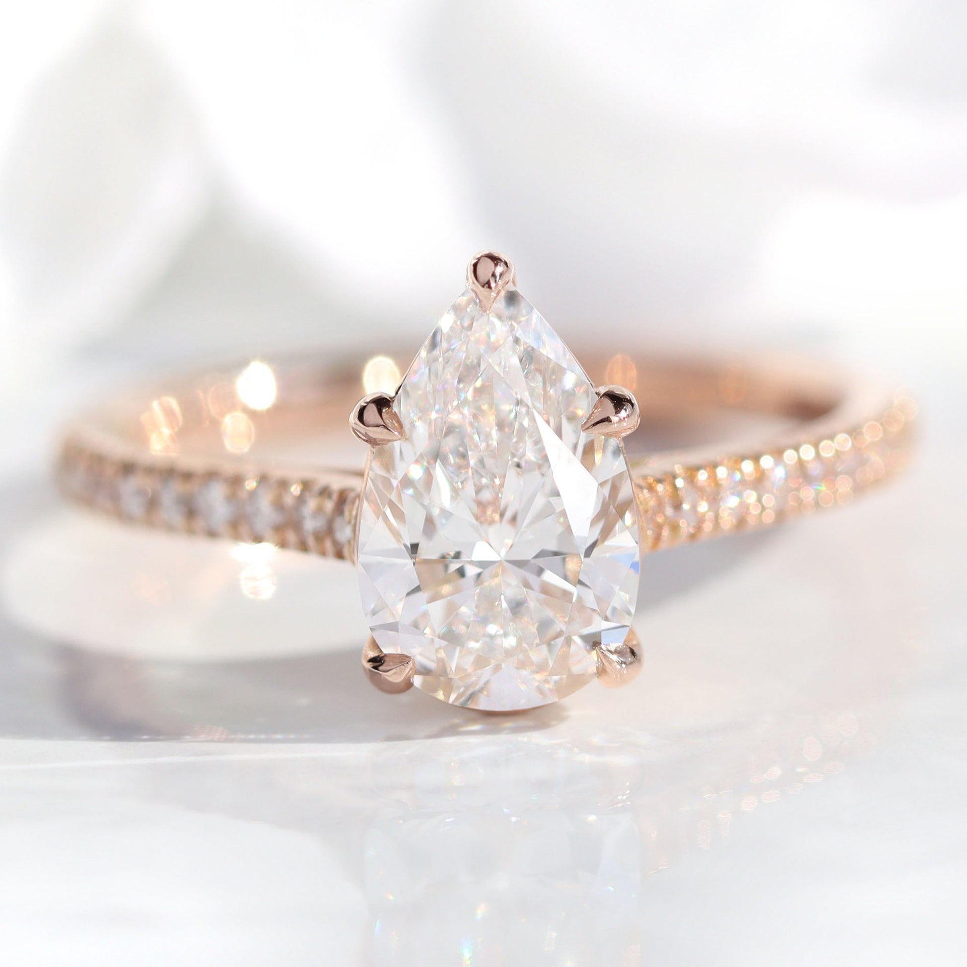 1.72 Ct. Pear Cut Lab Diamond Ring in 14k Rose Gold Pave Band, Size 6.25