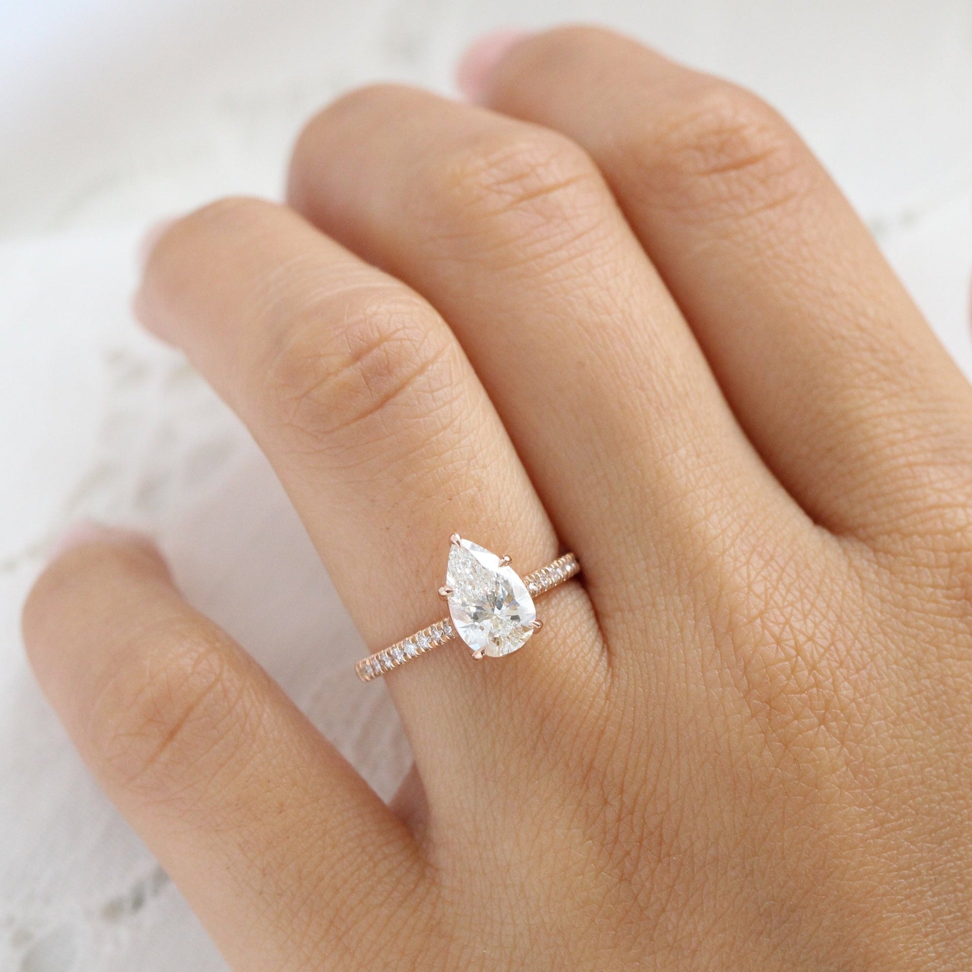 1.72 Ct. Pear Cut Lab Diamond Ring in 14k Rose Gold Pave Band, Size 6.25