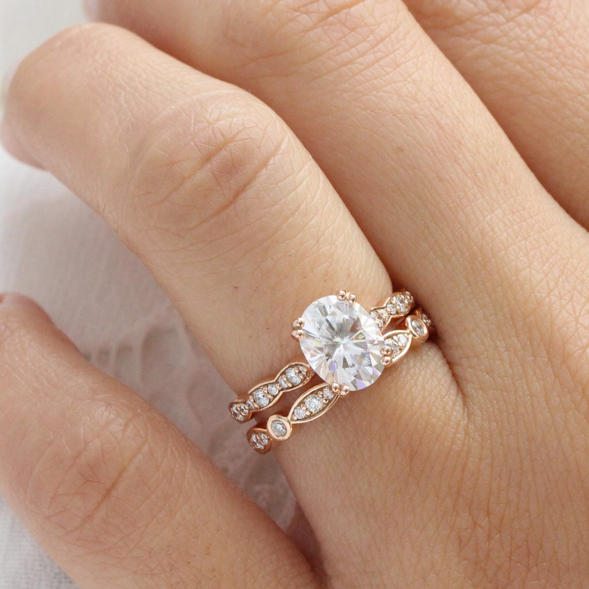 Oval Moissanite Engagement Ring in Grace Solitaire Diamond Band