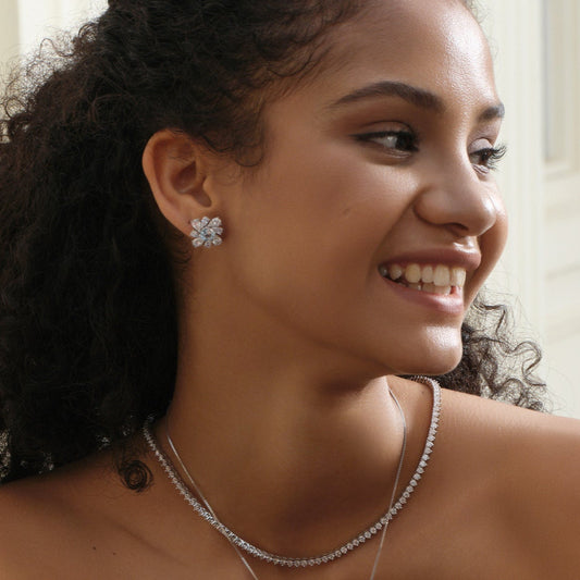 Tranquil Blossom Blue Topaz Stud Earrings - Stellaradorn
